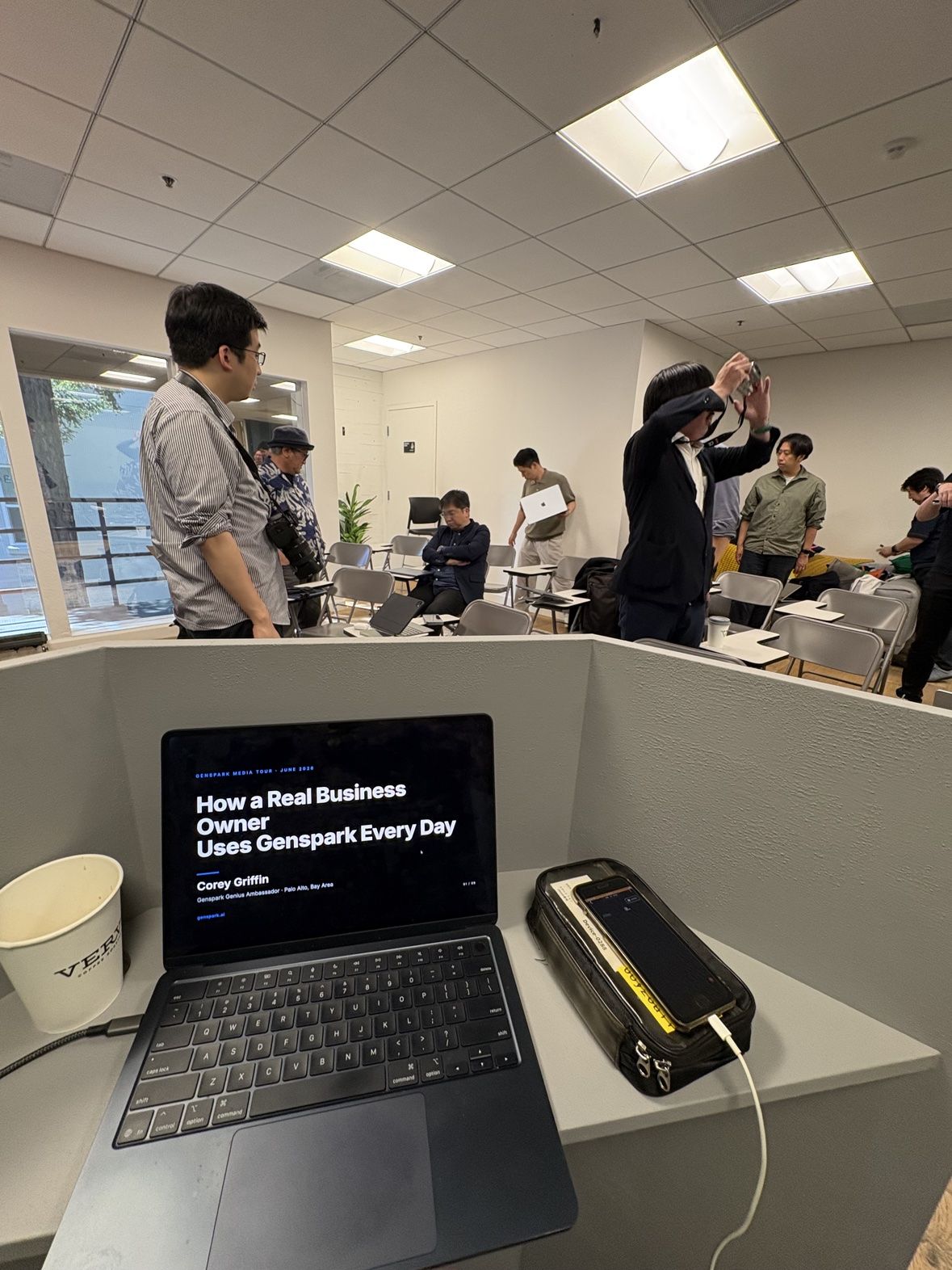 The session title on the podium laptop as attendees connect